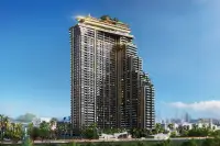 3 Bedroom Condo for Sale at Grand Solaire Noble bedroom with tufted headboard and evening city view through window