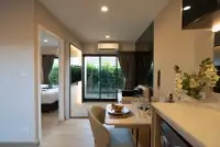 1 Bedroom Condo for Sale at The Indeed Condo Pattaya hallway view from dining area toward bedroom and balcony