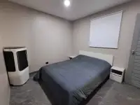 2 Bedroom Condo for Sale at Jomtien Beach Condominium master bedroom with queen bed and air cooler