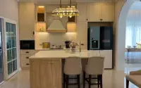 5 Bedroom House for Sale in Jomtien modern kitchen with marble island and built-in refrigerator