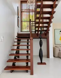 5 Bedroom House for Sale in Jomtien open wooden staircase with sculpture and skylight window