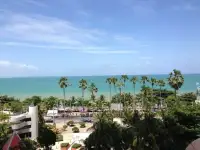 2 Bedroom Condo for Sale at Jomtien Plaza Condotel panoramic view of turquoise sea and palm-lined beachfront