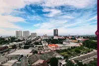 1 Bedroom Condo for Sale at Once Wong Amat panoramic high-floor view over Pattaya cityscape with blue sky