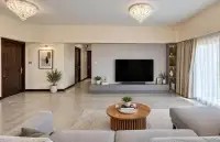 3 Bedroom Condo for Sale at Keha Thepprasit lounge with flat-screen TV, built-in media cabinet and crystal ceiling lights