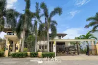 5 Bedroom House for Sale in Pattaya Paradise Village 2 exterior view with garden