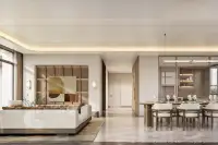 4 Bedroom House for Sale at Patta Riverine modern two-storey exterior with covered carport and large floor-to-ceiling windows