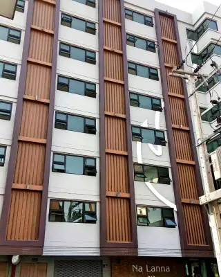 Lanna Condo bedroom with built-in shelving, wardrobe, and hallway view in Pattaya