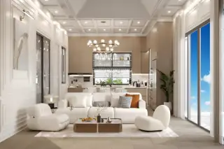 Larelana Villa spacious living room with white sofas, coffee table, and view into the modern kitchen area.