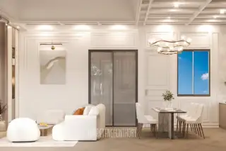 Larelana Villa living area with white sofa, modern chandelier, and dining table next to a glass sliding door.