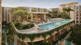Love It Wongamat Beach elevated lap pool with poolside bar sun loungers and lush landscaped terrace