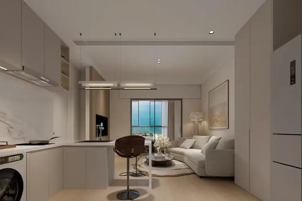 1 Bedroom Condo for Sale at Lucean Bay Jomtien Pattaya open-plan kitchen and living area with sea view balcony