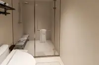 1 Bedroom Condo for Sale at Lucean Bay Jomtien Pattaya bathroom glass-enclosed shower with rainfall showerhead