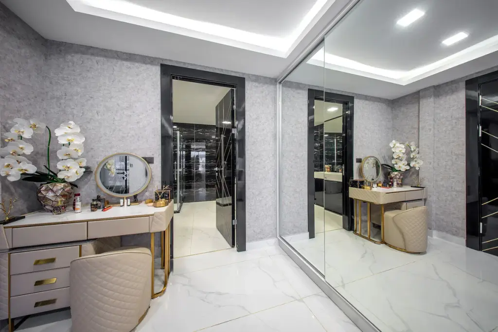 2 Bedroom Condo for Sale at Grand Solaire Noble luxury dressing room with gold vanity table, floor-to-ceiling mirror and marble flooring