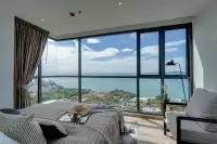2 Bedroom Condo for Sale at Andromeda Condominium bright bedroom with corner floor-to-ceiling windows and wide Pattaya sea view