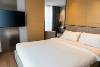 1 Bedroom Condo for Rent at Beverly Mountain Bay Pattaya bedroom with king bed and wall-mounted TV