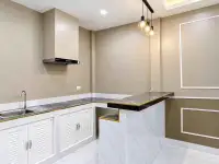 2 Bedroom House for Sale in Mabprachan kitchen with marble countertop, pendant lights, and sink