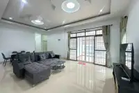 3 Bedroom House for Rent in Mabprachan living room with gray sectional sofa and glass doors to pool patio
