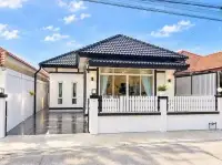 3 Bedroom House for Sale in Mabprachan modern white exterior with black tiled roof and marble driveway