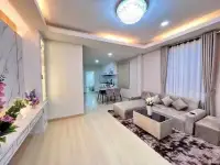 3 Bedroom House for Sale in Mabprachan spacious living area with marble feature wall and wood flooring