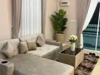 3 Bedroom House for Sale in Mabprachan cozy lounge corner with plush sofa and potted plant by window
