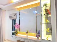 3 Bedroom House for Sale in Mabprachan illuminated marble accent wall with golden display shelving