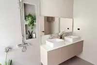 4 Bedroom House for Sale in Mabprachan featuring modern double sink vanity with marble countertop and rain shower