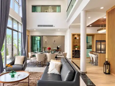5 Bedroom House for Rent in Mabprachan double-height living room with open kitchen and dining area