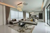5 Bedroom House for Sale in Mabprachan private pool with loungers and arched window facade