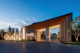 Madcha Le Villa open-plan living room with large sectional sofa, dining area, and modern kitchen.