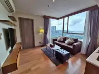 1 Bedroom Condo for Rent at Marina Bayfront Sriracha living room with brown sofa and sea view windows