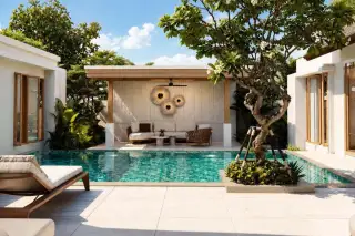 Mirama Pattaya outdoor private pool with shaded lounge pavilion, sun lounger, and frangipani tree