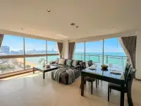 2 Bedroom Condo for Sale at Northshore Pattaya open-plan living and dining area with panoramic ocean and city views