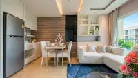 1 Bedroom Condo for Sale at La Santir kitchen with stainless fridge and dining table beside lounge