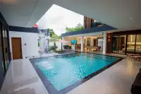 7 Bedroom House for Sale & Rent at Nagawari Pattaya covered patio with pool, waterfall wall and pool table