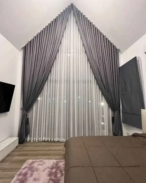 3 Bedroom House for Rent in Na Kluea bedroom with vaulted ceiling and floor-to-ceiling draped curtains