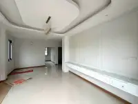 4 Bedroom House for Sale in Nong Pla Lai open living area with tray ceiling and marble-top built-in bench