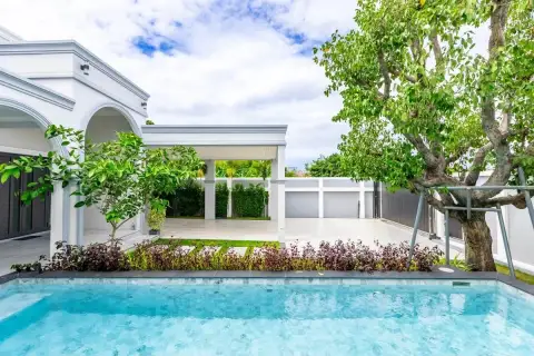 4 Bedroom House for Sale in Nong Prue featuring pool, covered carport and landscaped garden