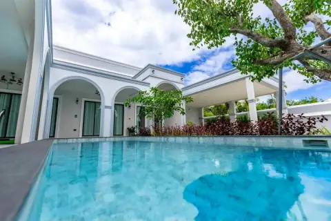 4 Bedroom House for Sale in Nong Prue showing poolside view of arched patio and bedrooms
