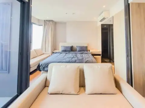 1 Bedroom Condo for Rent at Once Pattaya bed with sofa facing balcony and mirrored closet