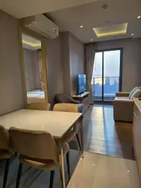 2 Bedroom Condo for Sale at Once Pattaya open-plan living and dining area with sea-view balcony window