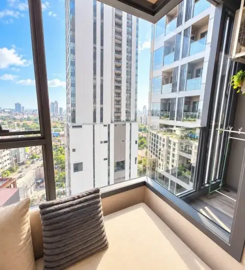 Studio Condo for Rent at Once Pattaya window seat balcony with city high-rise views