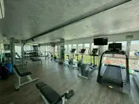 1 Bedroom Condo for Sale at One Tower Pratumnak fully equipped fitness center with city view windows