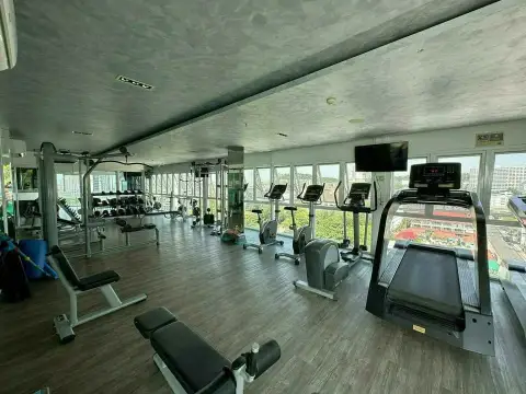 1 Bedroom Condo for Sale at One Tower Pratumnak fully equipped fitness center with city view windows