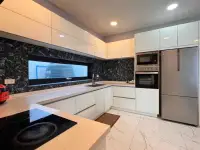 4 Bedroom House for Sale at Palm Spring villa Pattaya modern kitchen with white cabinets and stainless steel appliances