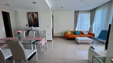 2 Bedroom Condo for Rent at Palm Wongamat open-plan living and dining area with Buddha artwork