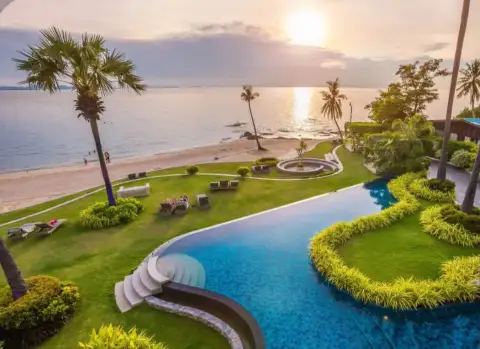 2 Bedroom Condo for Rent at Palm Wongamat resort pool and beach view at sunset