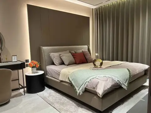 1 Bedroom Condo for Rent at Panora Estuaria bedroom with bed, side table, and flowing curtains