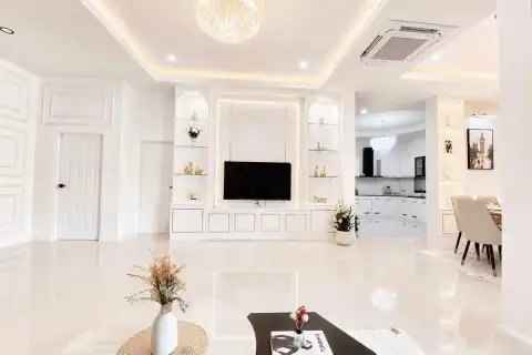 3 Bedroom House for Sale at Paradise Hill 2 spacious living area with TV wall opening to kitchen