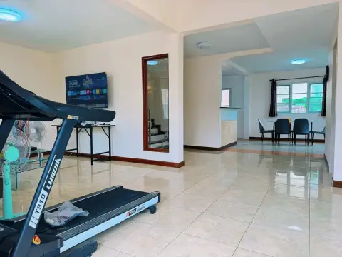 4 Bedroom House for Rent at Park Hill Village open-plan living area leading to dining room and kitchen
