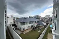1 Bedroom Condo for Sale at Park Royal 3 balcony view of neighboring villa and city rooftops
